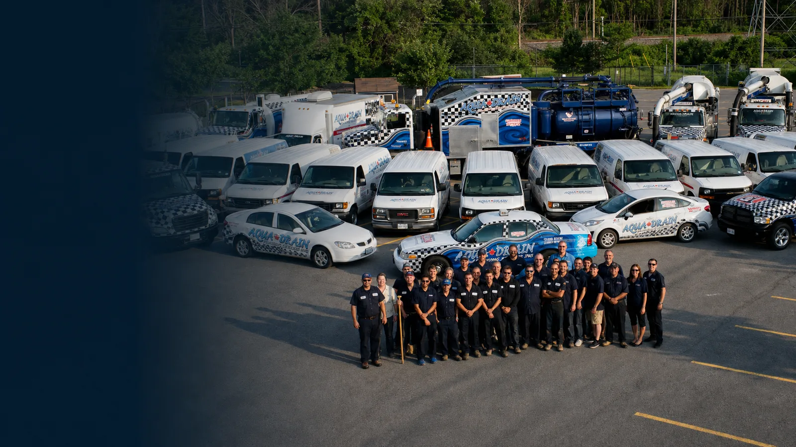Aqua Drain crew and service fleet staged for drain, sewer, and excavation dispatch